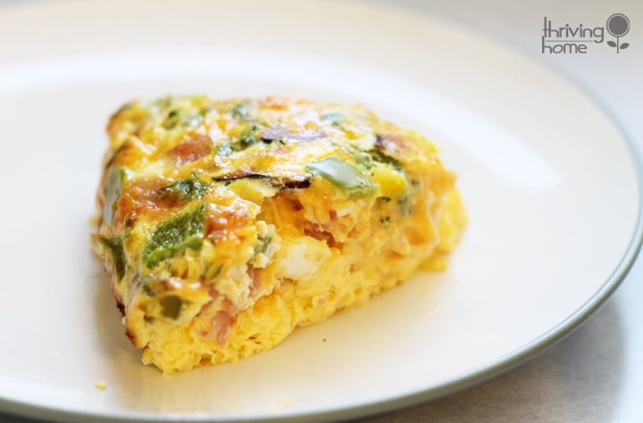 This oven omelet is easy to make and feeds a large crowd. It's also incredibly versatile - pack it with any breakfast meats or veggies!