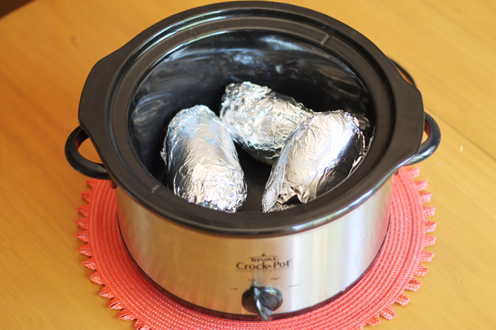 Crock pot potatoes are a great alternative to heating up your house with the oven. 