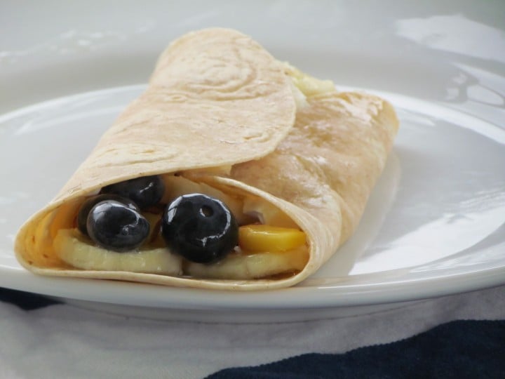 These fruit pizza roll-ups are so easy for kids to whip up! Pick your favorite fruits and let your kids have at it.