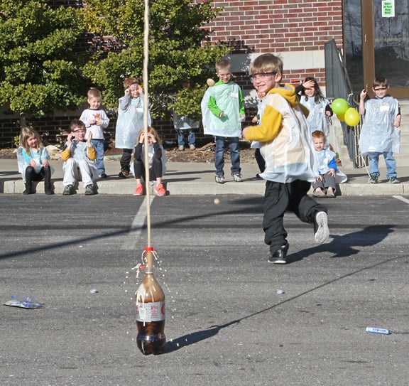 Mentos and Diet Coke Experiment at science birthday party