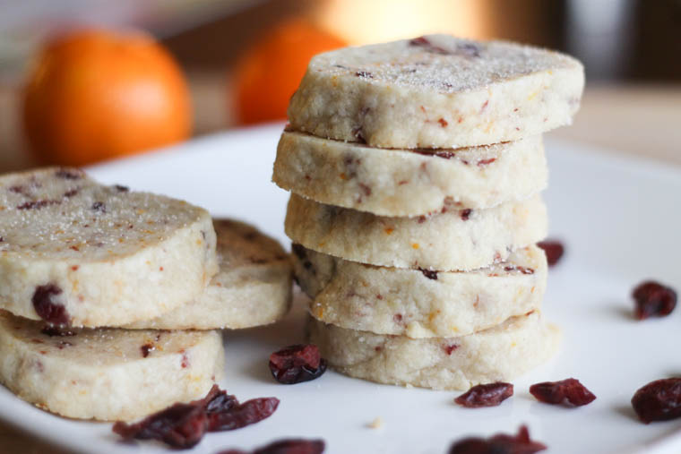 This cranberry-orange shortbread cookie is nothing short of delicious. Take the buttery-goodness of a classic shortbread and infuse it with fresh orange zest and cranberries. The result: an crowd-pleasing, unforgettable cookie! | Thriving Home