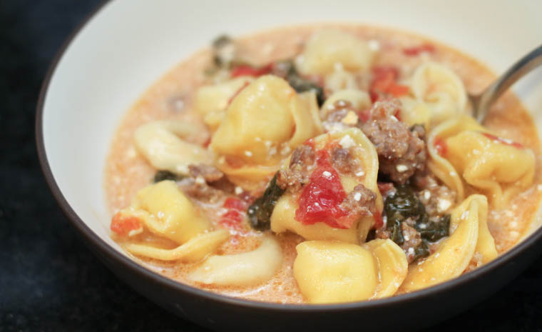 Finally, a slow cooker recipe that is SUPER easy to make yet packed with flavor. The creamy goodness of this crock pot sausage tortellini soup is a win with all ages and makes for great lunch leftovers.