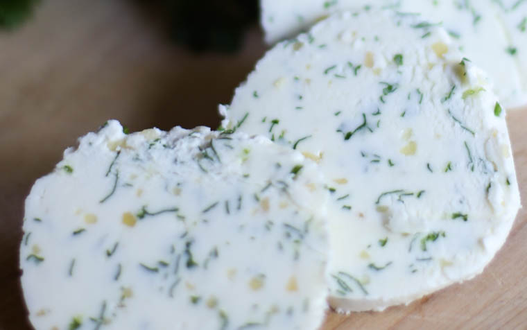 close up shot of Sliced garlic herb butter