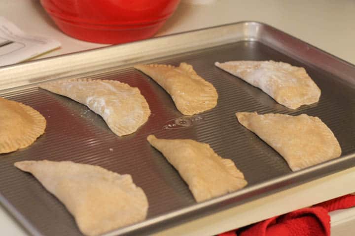 Homemade pizza pockets are a kid and adult favorite! They're packed with the yumminess of pizza without any added ingredients or fillers.