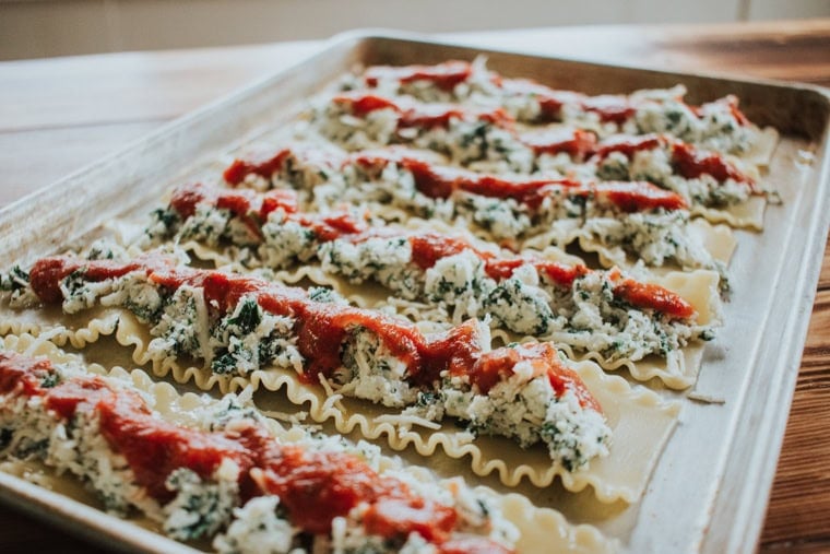 Spinach lasagna filling on cooked noodles