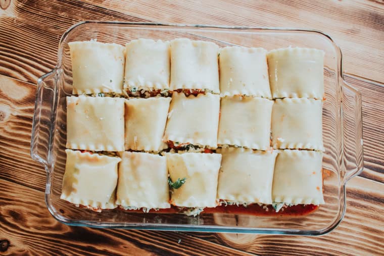 Spinach lasagna rolls in a baking dish