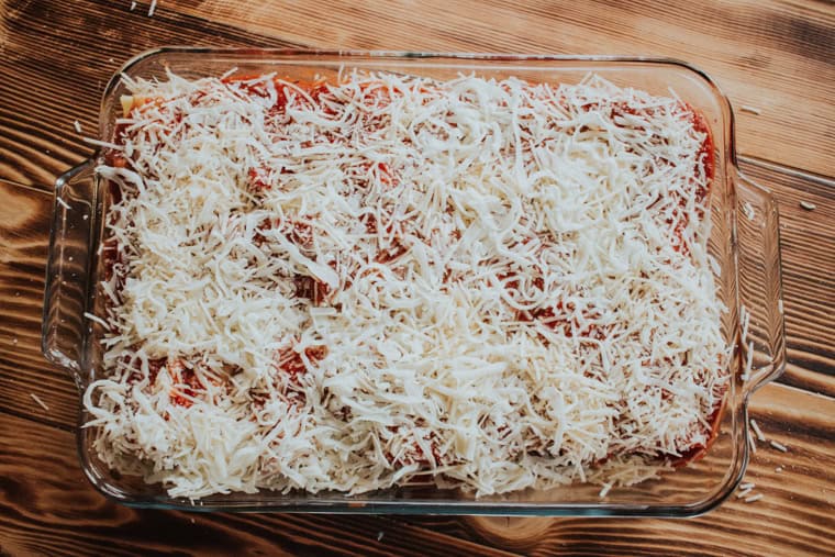 Spinach lasagna rolls in a baking dish