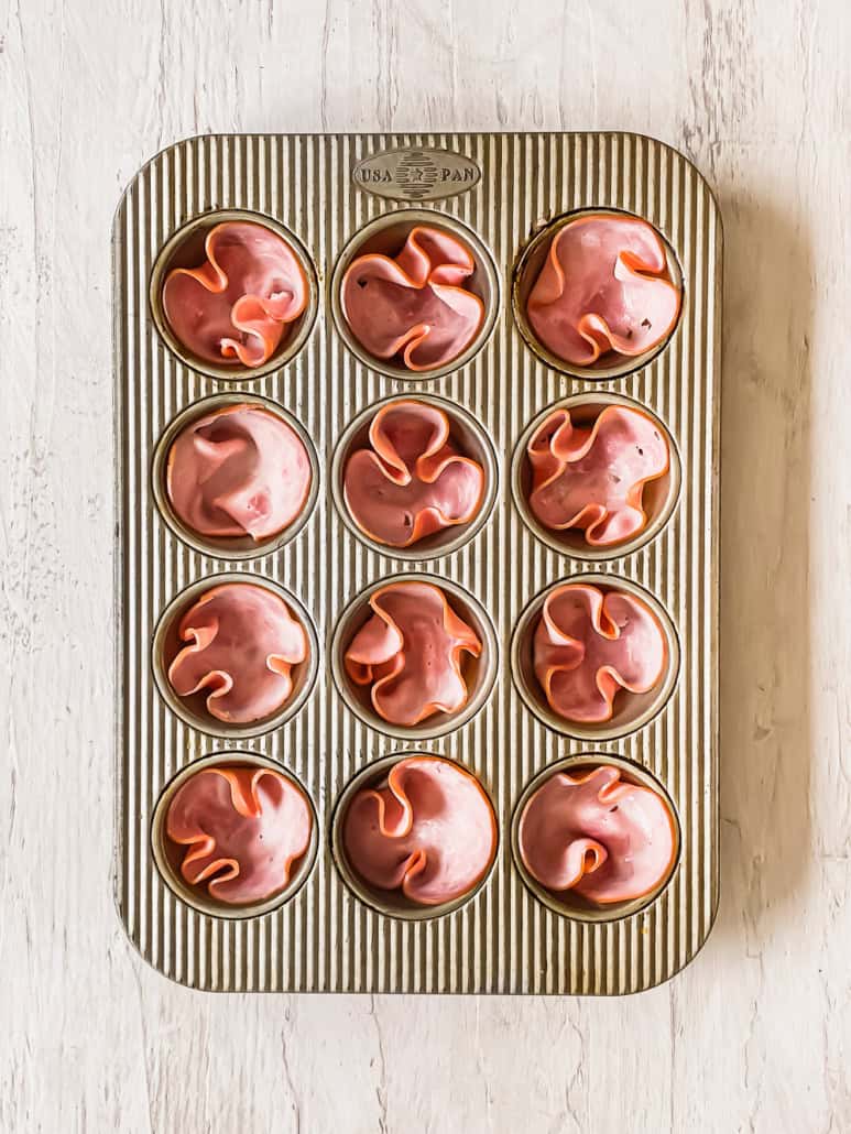 ham slices in a muffin tin