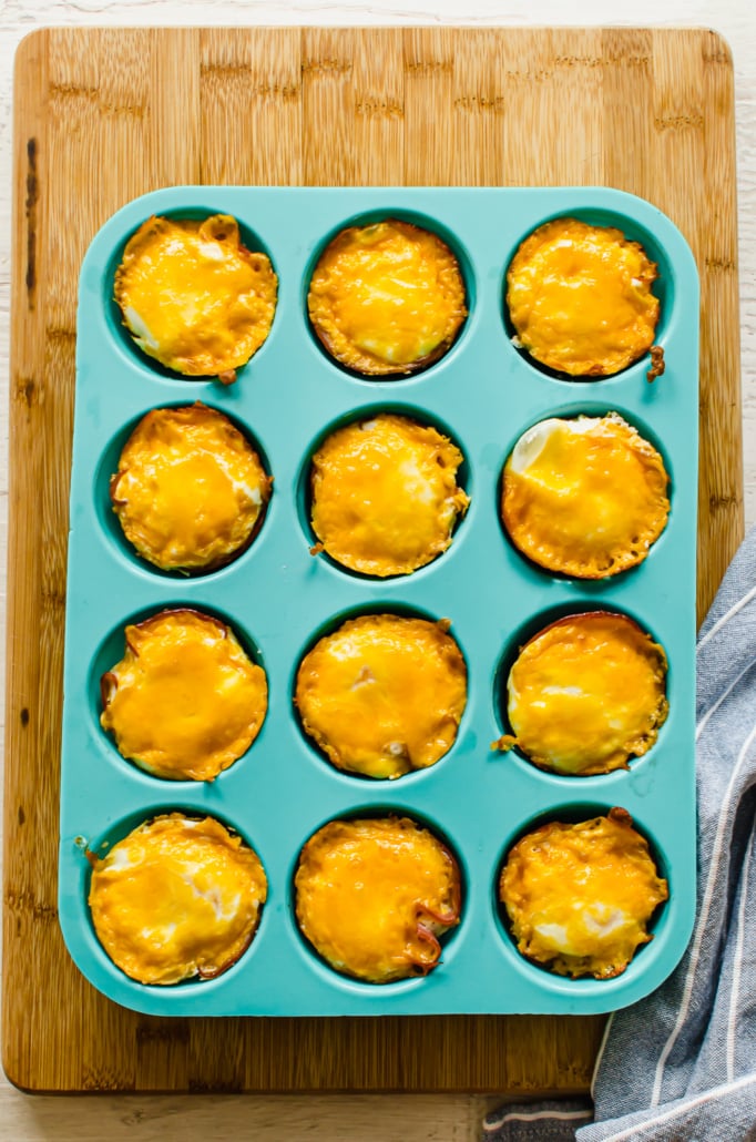 overhead shot of baked egg cups in a silicone muffin pan