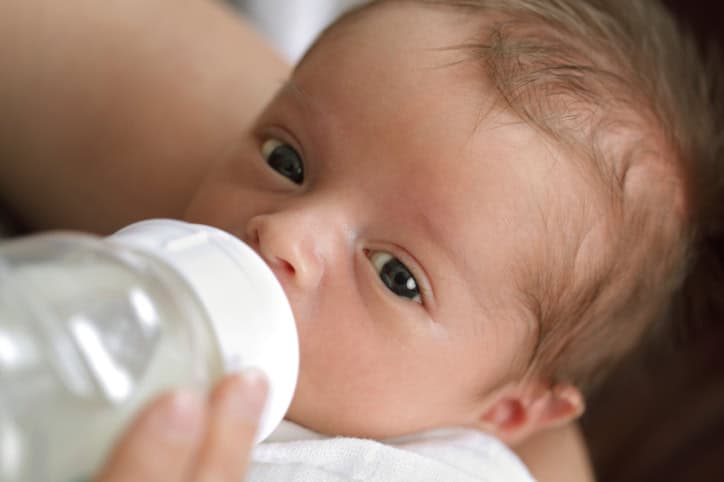 Baby drinking from a bottle