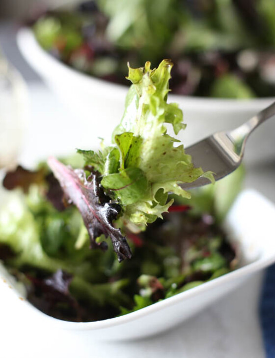 Wilted Lettuce Salad in a bowl with a fork
