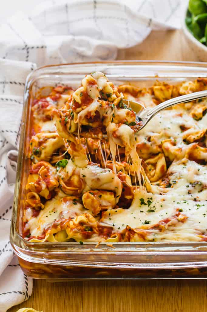 baked cheese tortellini in glass dish 
