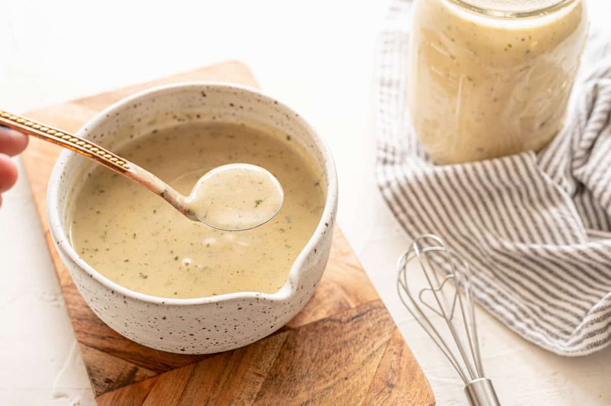 Cream of Chicken Soup served in a small dish with a ladle.