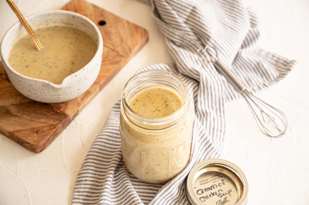 Homemade Cream of Chicken Soup in a mason jar with lid off.