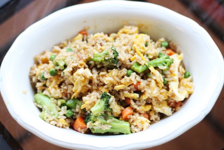 fried rice in a bowl with veggies