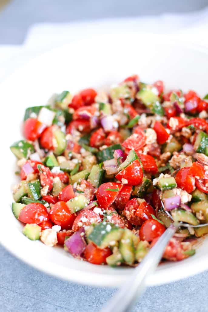 Cucumber Tomato Feta Salad in a white bowl