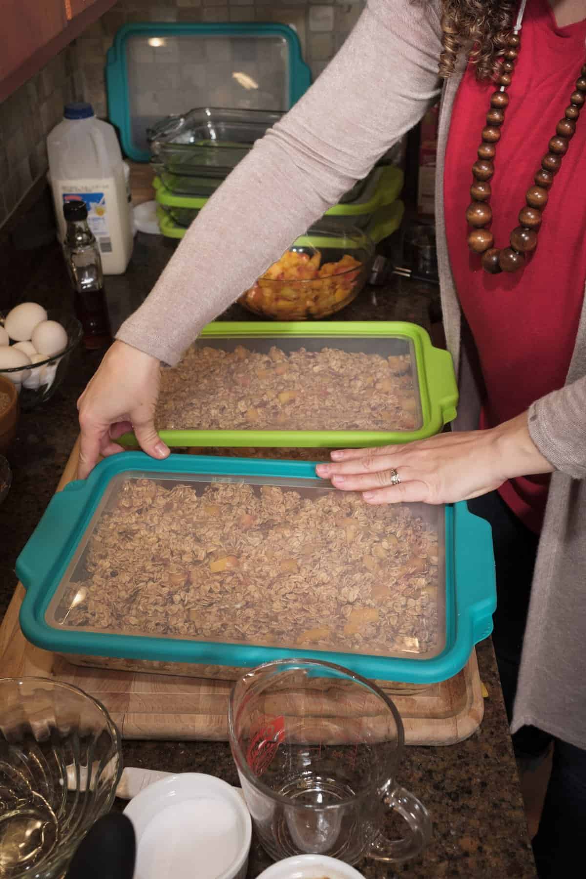 Woman preparing freezer meals for a freezer club.