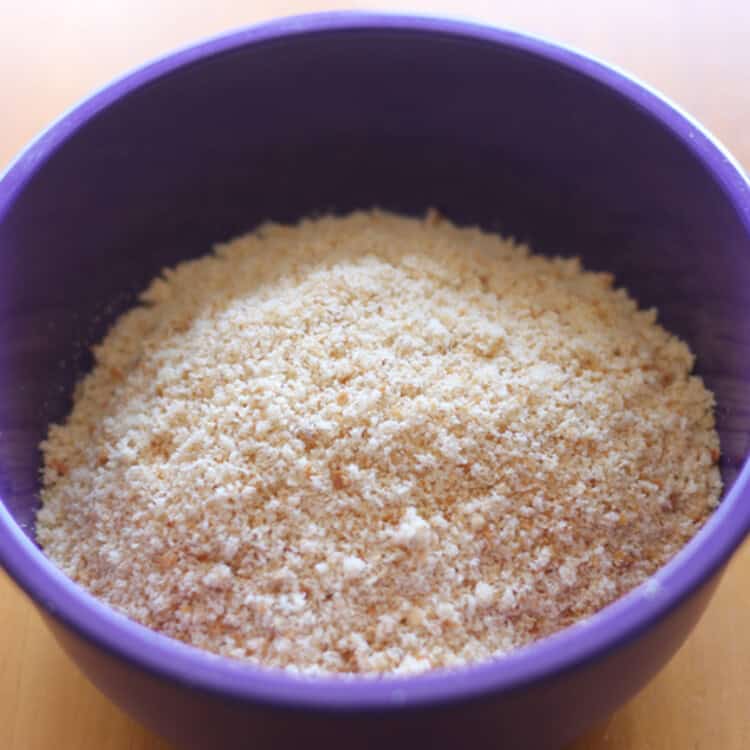 Homemade bread crumbs in a blue bowl.