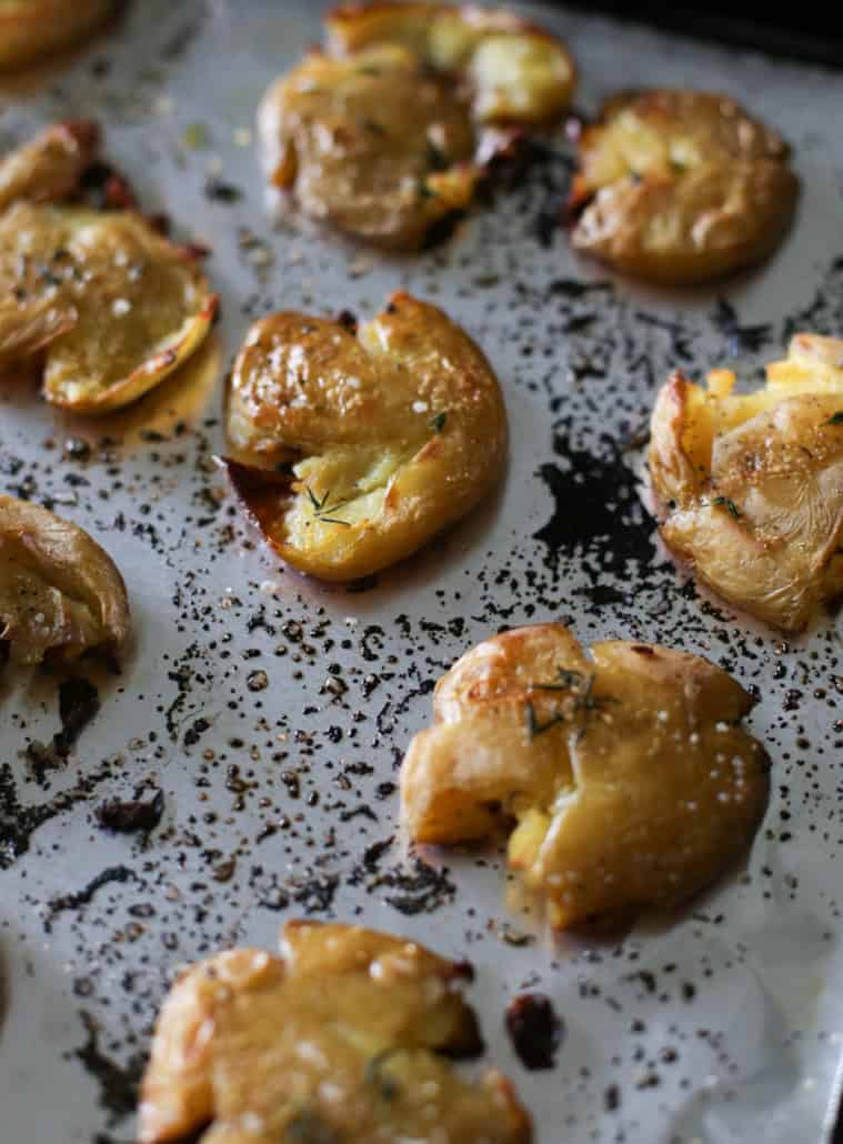 Crispy Smashed Potato on a baking sheet.