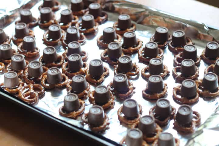 Pretzel rolo bites on a baking sheet