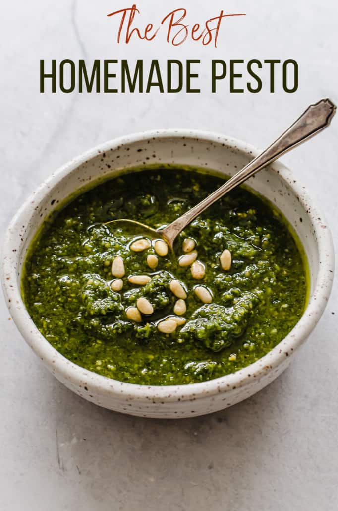Homemade pesto in a bowl with a spoon