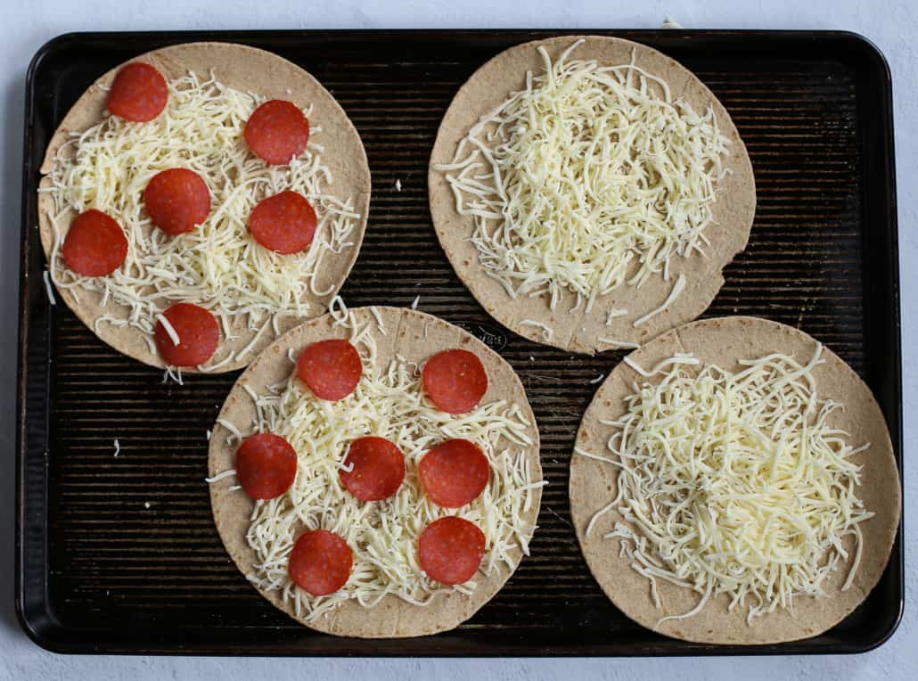 tortillas with cheese and toppings on top