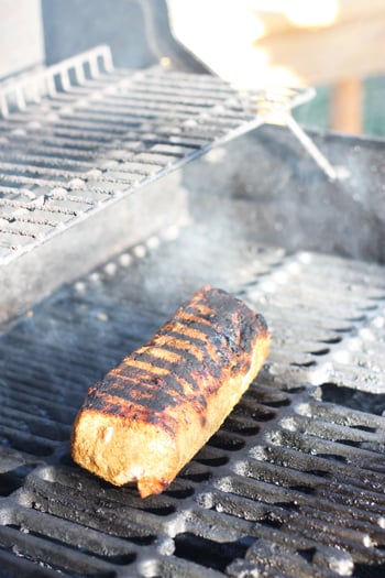 A pork tenderloin on the grill