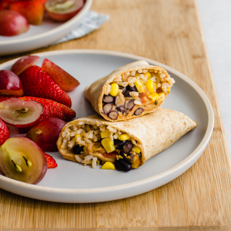 freezer-friendly lunch wraps on a wooden cutting board