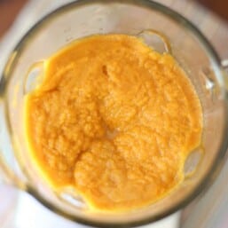 Butternut squash puree in a glass bowl.