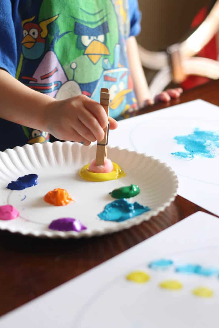 Easy Easter Craft: Painting Eggs with Pom Pom Balls | Thriving Home