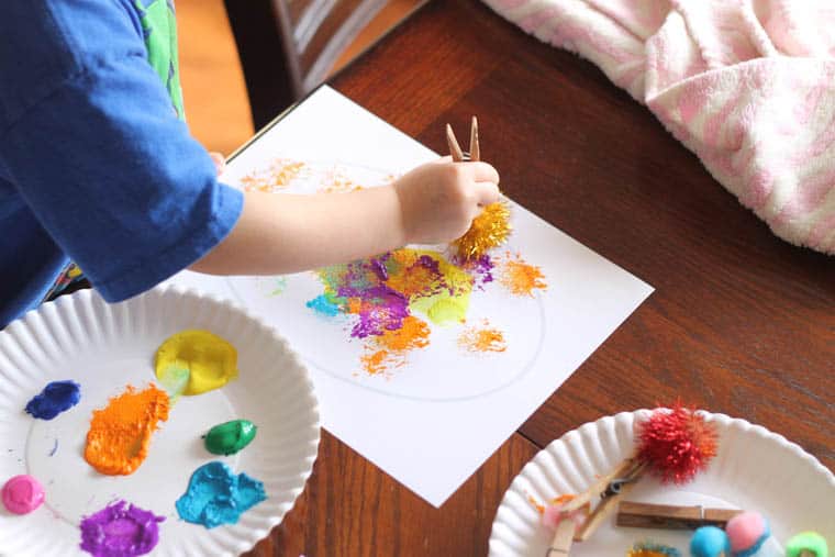 Easy Easter Craft Painting Eggs with Pom Pom Balls 