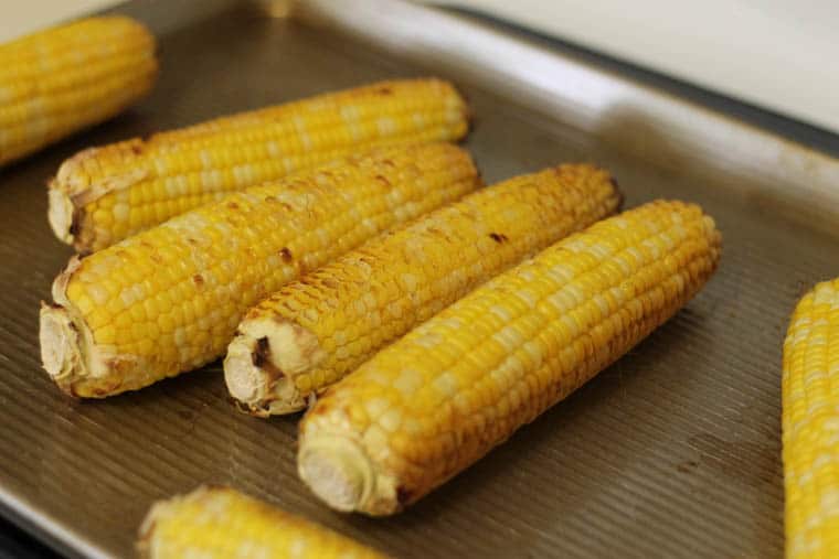 Roasted Corn and Black Bean Salsa - A BIG batch freezer recipe that your family and friends will love. Perfect for all those summer veggies! 