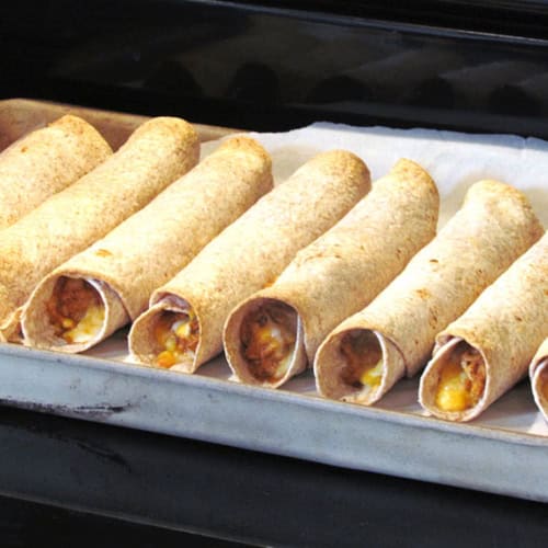 Slow Cooker Chicken and Cheese Taquitos are super easy and a kid favorite!