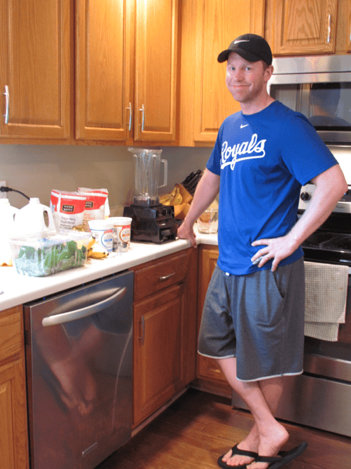 Rachel's husband with all his smoothie ingredients on the counter