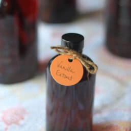 Homemade vanilla in an amber 8-ounce bottle with a gift tag.