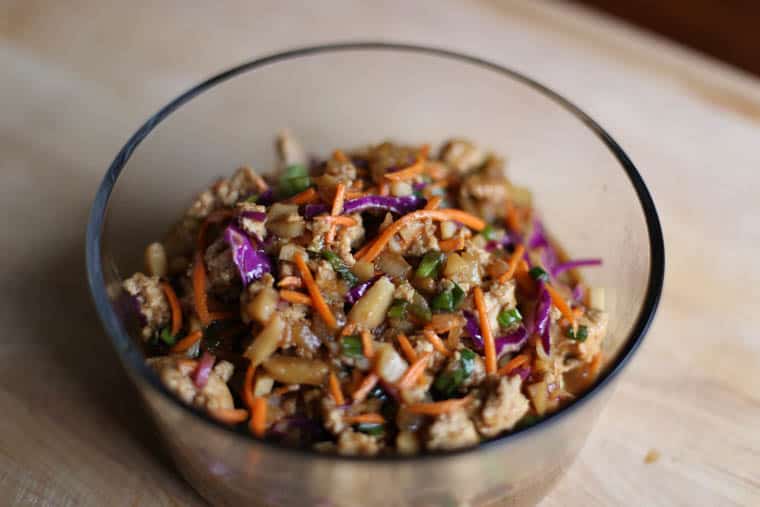 A delicious twist on Asian lettuce wraps. Add a tortilla for a whole different, healthy dinner. Asian Chicken Tortilla Wraps are also freezer friendly and would make a great meal to take to others. | Thriving Home
