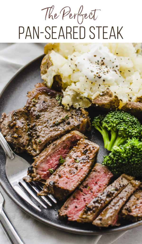 seasoned cooked steak that is sliced on a plate