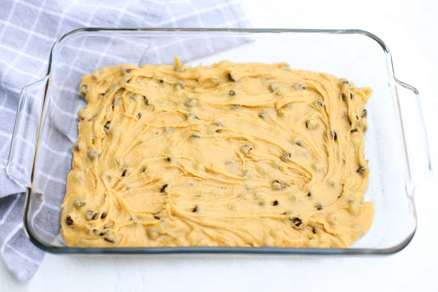 blondies batter in a casserole dish