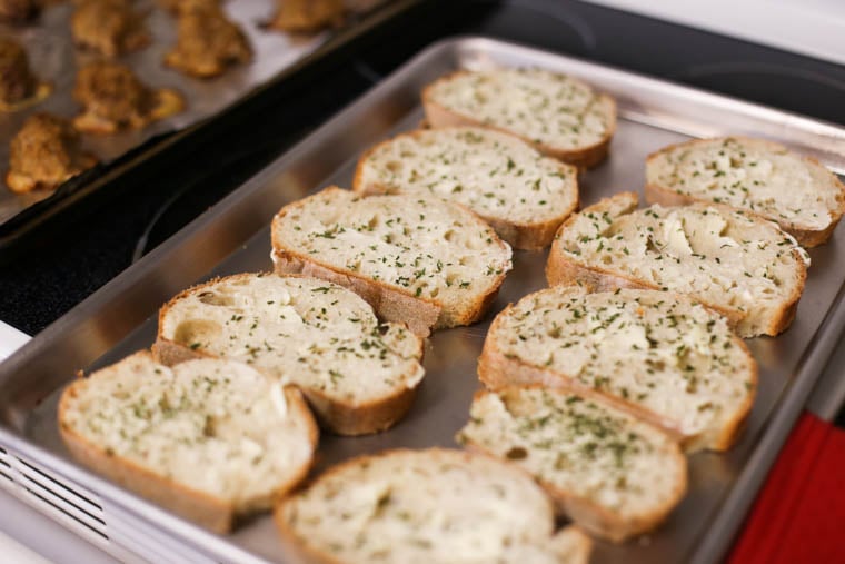 Seasoned Texas toast prepped to go into the oven. 