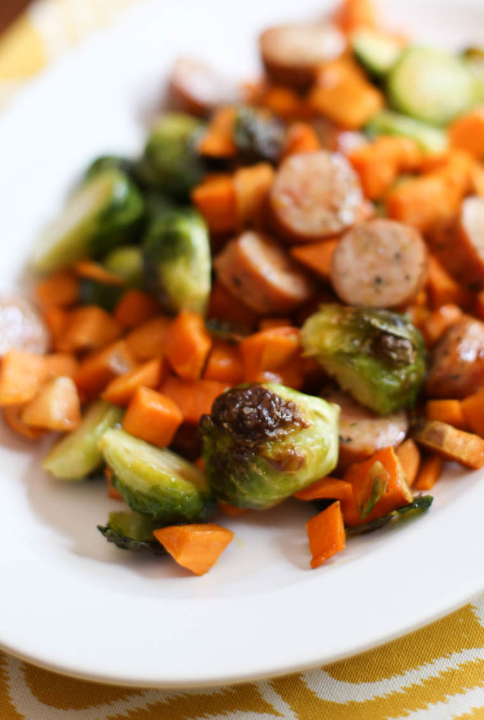 Super easy and healthy lunch (or dinner) idea: Roasted Brussels Sprouts, Brats, and Sweet Potatoes. 