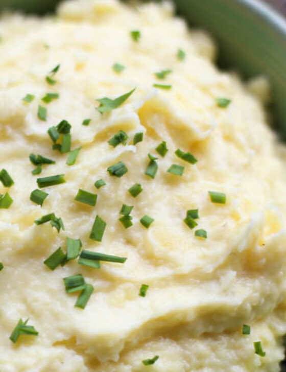 Instant Pot Mashed Potatoes with diced chives on top.