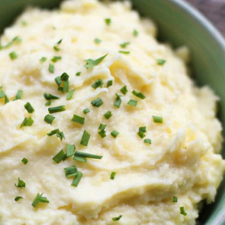 Instant Pot Mashed Potatoes with diced chives on top.