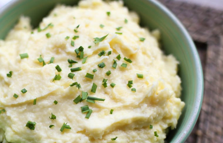 Instant Pot Mashed Potatoes with diced chives on top. 