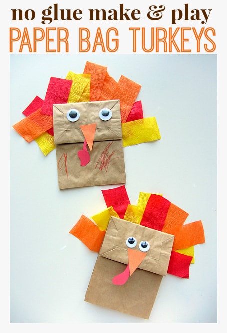 Lunch-size brown paper sacks with google eyes, an orange construction paper beak, and red, orange, yellow crepe paper feathers.