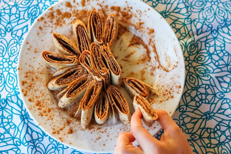 cinnamon tortilla rolls on a plate