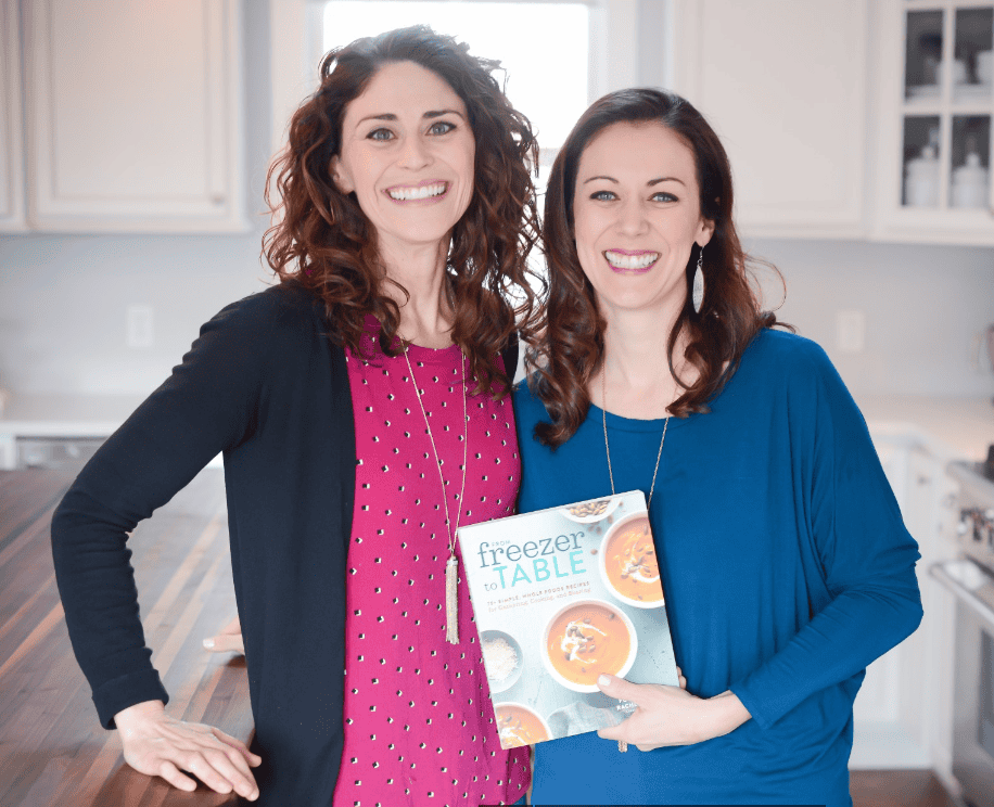 Rachel and Polly with cookbook, From Freezer to Table.