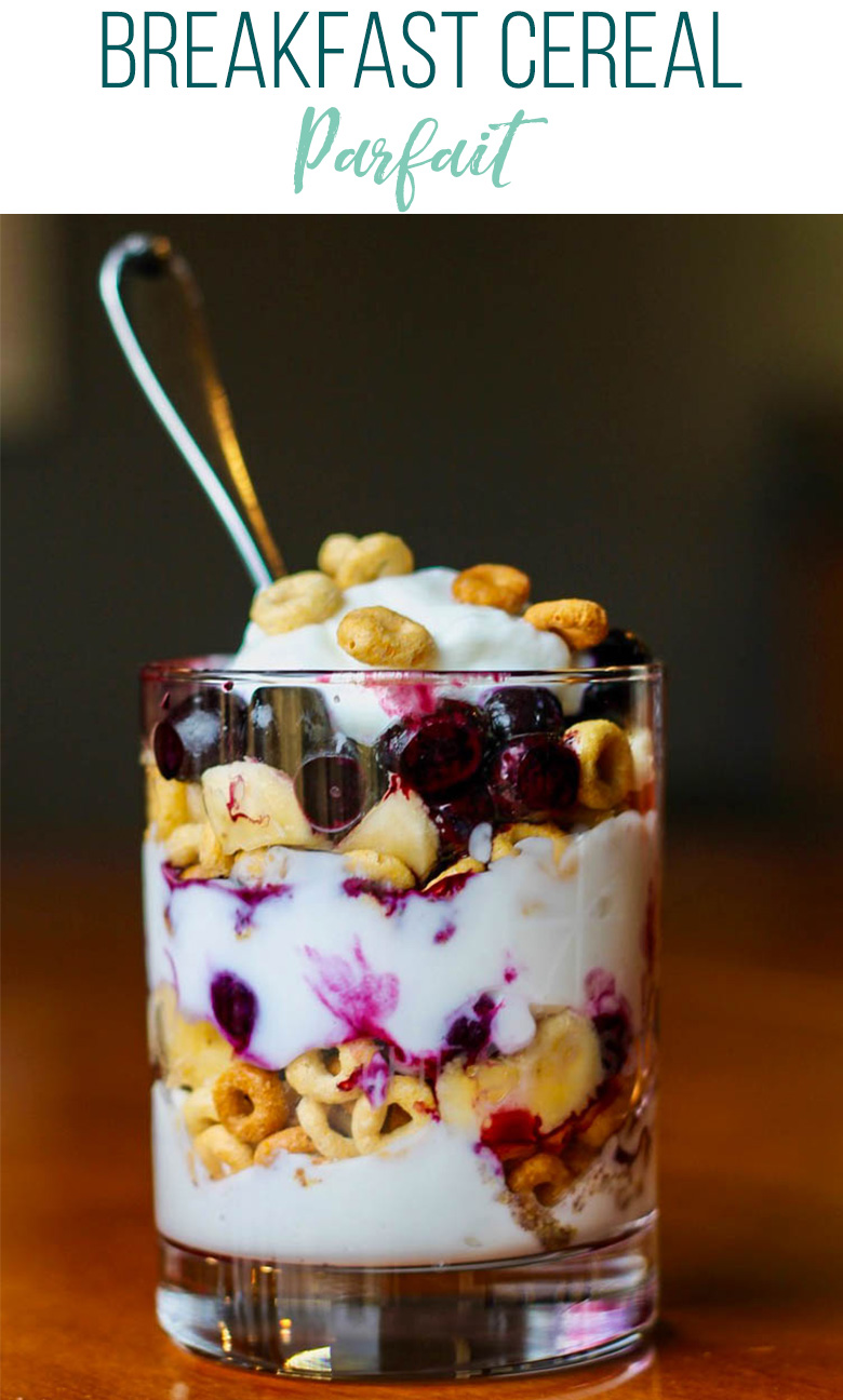 Breakfast Cereal Parfait with layers of Greek yogurt, bananas, blueberries, and breakfast cereal.