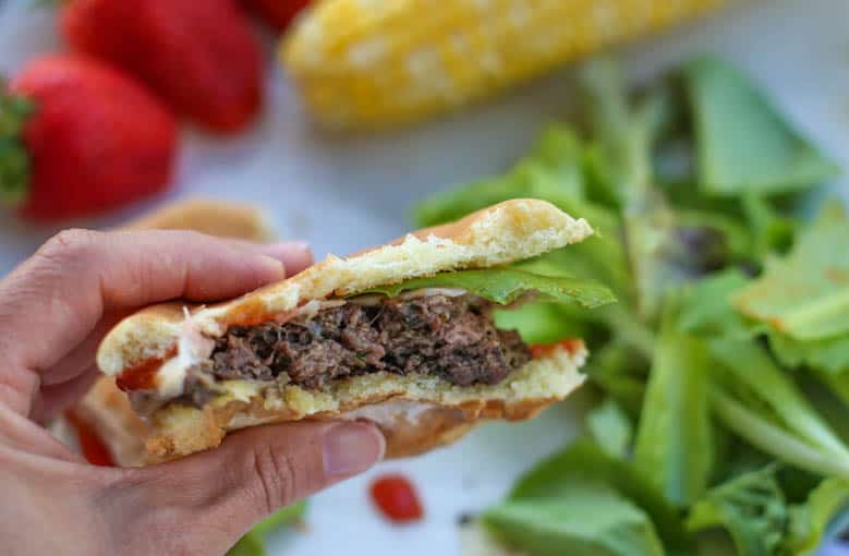 Pesto burger cut in half