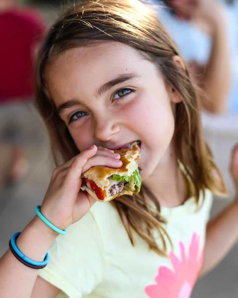 Girl eating a burger