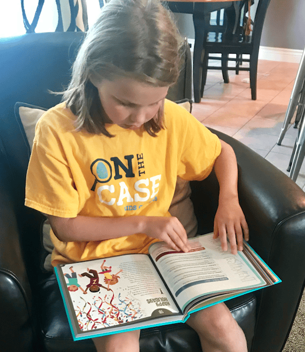 girl with devotional book